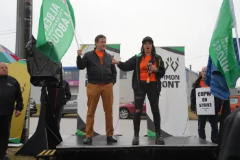 AFL President Gil McGowan and Financial Secretary Cori Longo speaking